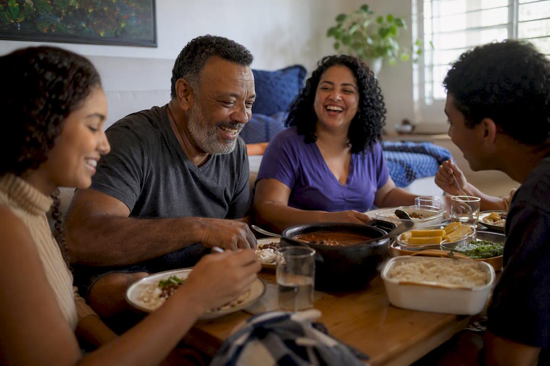 Brazilian family lunching at home during workday